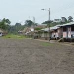 View of the store (right), some houses, and the medical clinic (left)